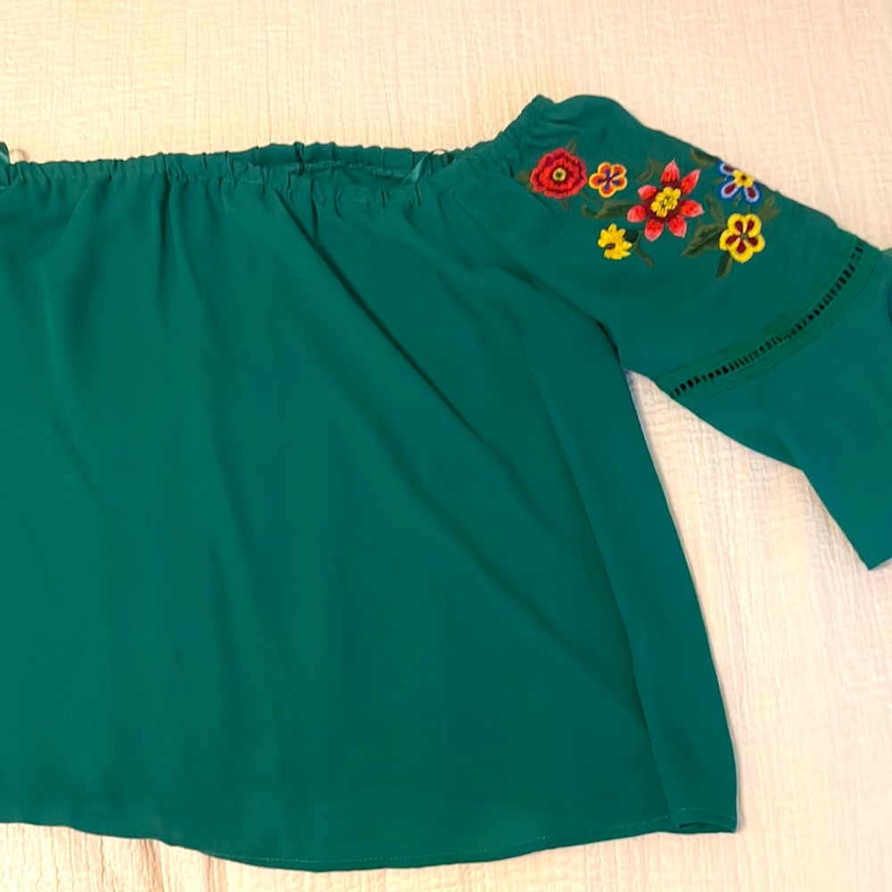 Green off the shoulder top with floral embroidery